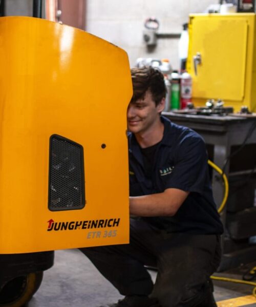 Bailey Equipment and Intralogistics worker performing forklift maintenance in Tennessee