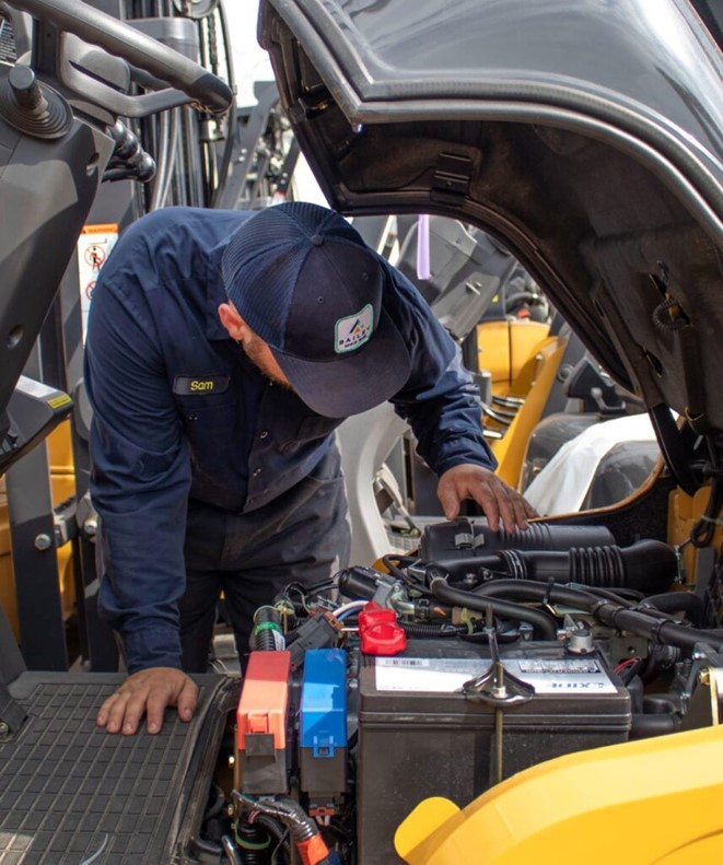 Bailey Equipment and Intralogistics worker performing forklift maintenance