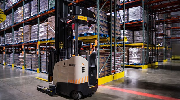 Warehouse interior featuring a Crown forklift